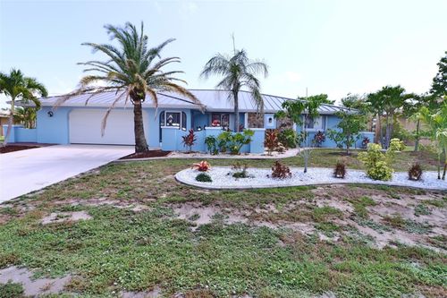 107 Sinclair St Se, PORT CHARLOTTE, FL, 33952-9140 | Card Image