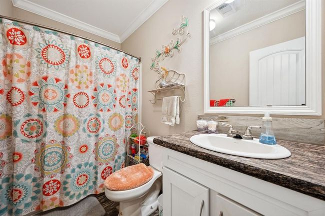 The hall bath features a tub/shower combination for your convenience! | Image 18