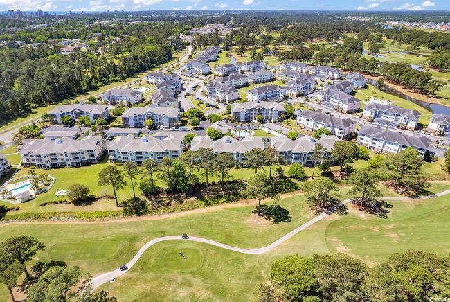 Birds eye view of property with view of golf course | Image 32