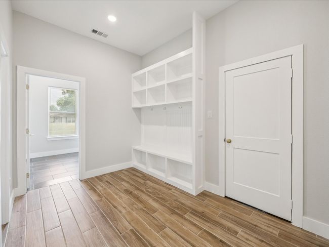 Mudroom with wood finished floors and recessed lighting | Image 24