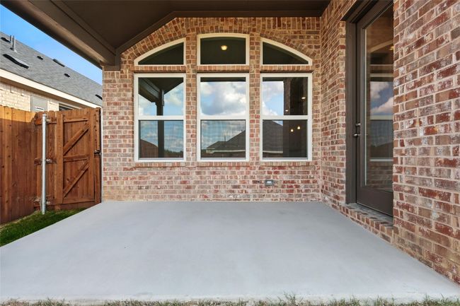 View of patio featuring a gate | Image 29