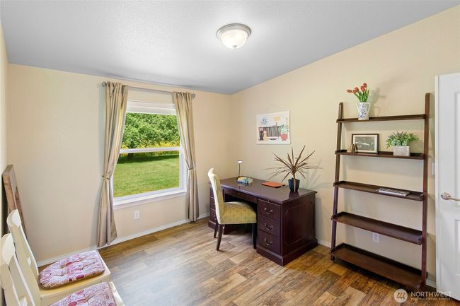 Bonus room off the living room and primary bedroom. | Image 13