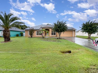 1121 Douglas Street Se, House other with 4 bedrooms, 3 bathrooms and null parking in Palm Bay FL | Image 3