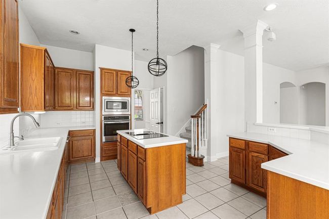 1807 Rustic Hills Ct, House other with 5 bedrooms, 4 bathrooms and 2 parking in Sugar Land TX | Image 11