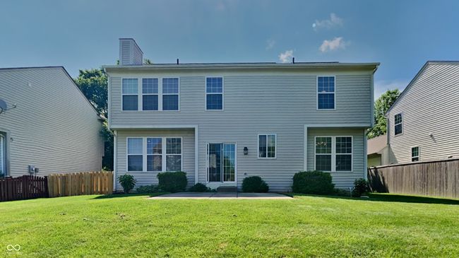 rear view of house with a patio and a chimney | Image 20