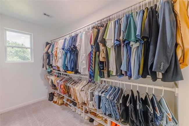 Primary bedroom large walk-in closet! | Image 18