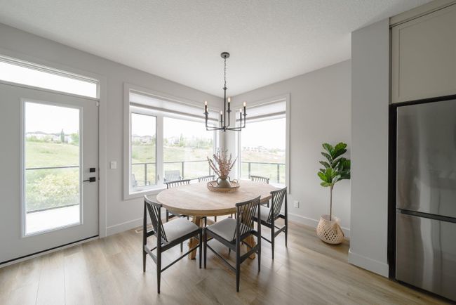 98 Royal Elm Green Nw, Home with 4 bedrooms, 3 bathrooms and 4 parking in Calgary AB | Image 6