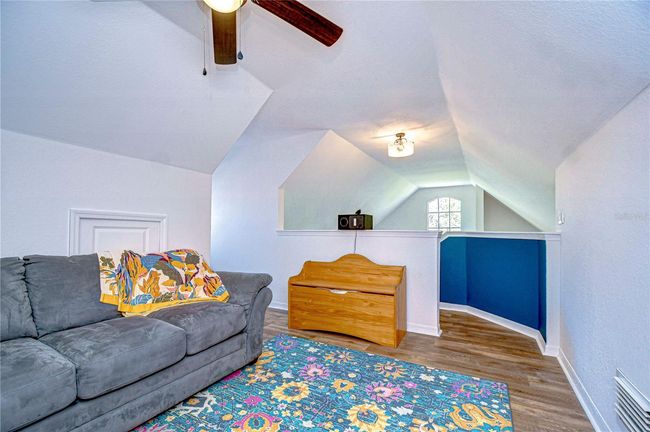 View from bookshelf back toward stairs | Image 25
