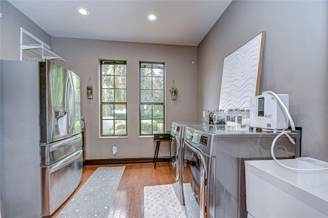 Bedroom 7 has been turned into a large laundry room! | Image 29