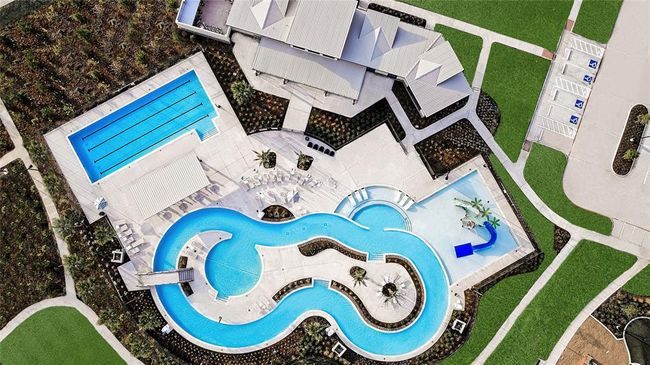 Relax poolside in the water area. | Image 38