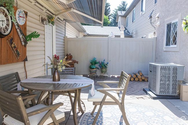 View of patio with outdoor dining space | Image 23