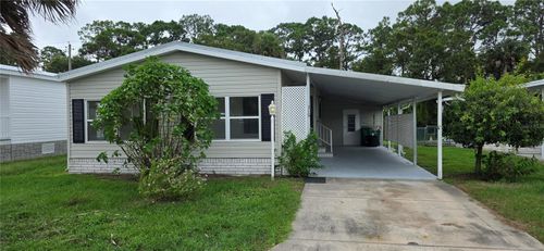 315 Papaya Cir, Barefoot Bay, FL, 32976-6850 | Card Image