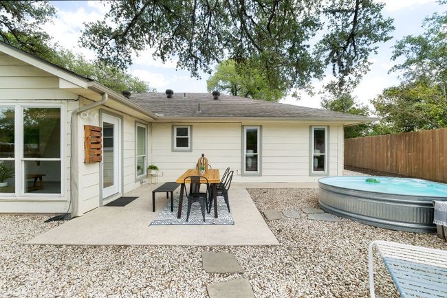 Shaded patio with stock tank pool | Image 31
