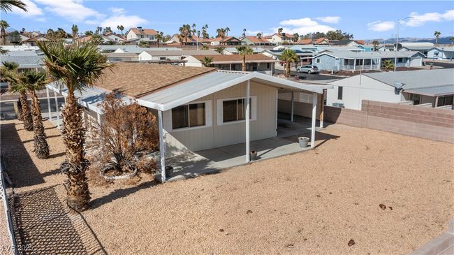 Rear view of house with fence private yard, and a residential view | Image 57