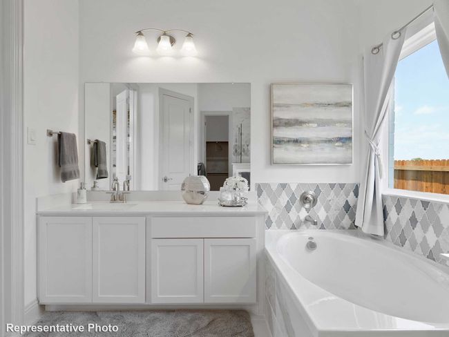 Full bath with a bath and vanity | Image 10
