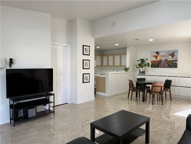 Living room with baseboards, marble finish floor, and recessed lighting | Image 11