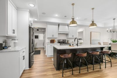 Beautiful granite center island, plenty of counter top space. | Image 3