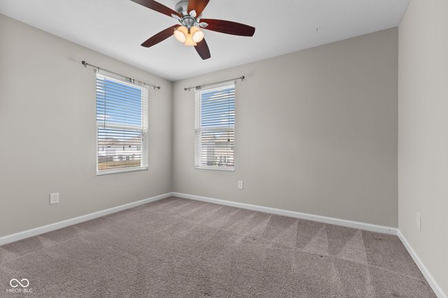 Carpeted Bedroom featuring ceiling fan and baseboards | Image 23
