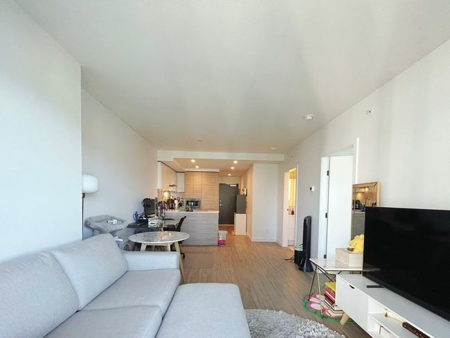 Living area featuring light wood finished floors, recessed lighting, and baseboards | Image 5