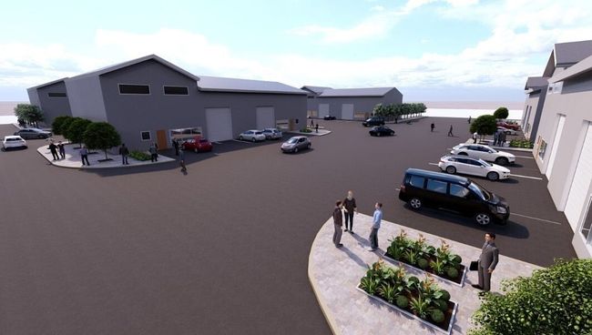 View of car parking featuring a water view | Image 15