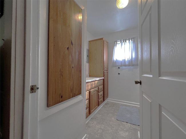 Downstairs guest bathroom. | Image 24