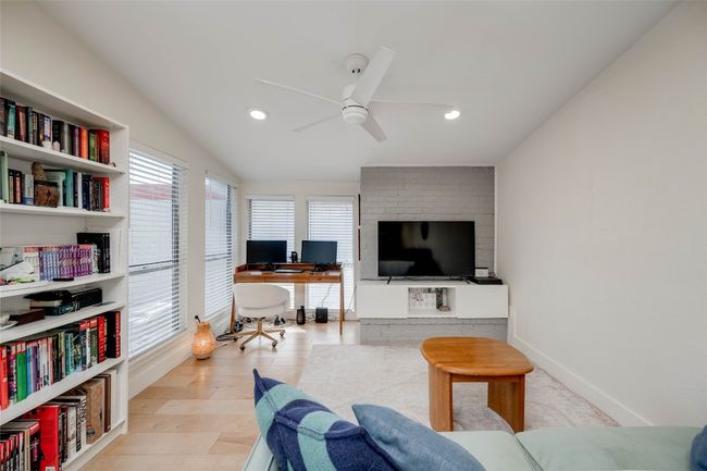 Living room featuring a ceiling fan, a desk, recessed lighting, and wood finished floors | Image 6