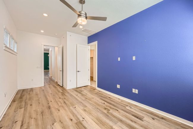 Spacious primary suite with lots of natural light. | Image 14