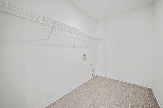 A very large laundry room on the 2nd floor. | Image 19