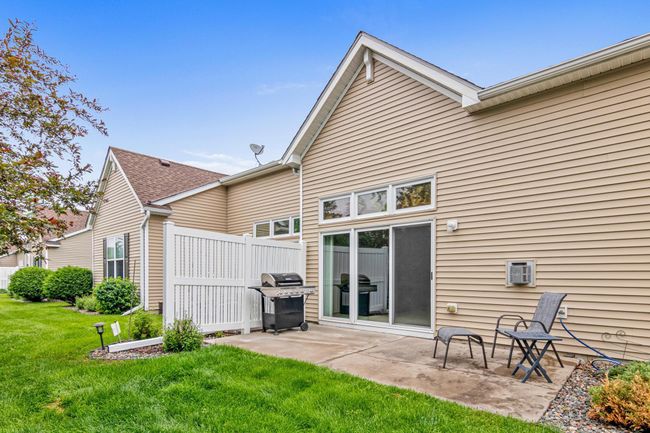large patio with green space | Image 18