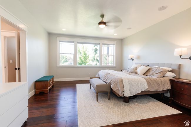 Bedroom featuring dark wood-style flooring, a ceiling fan, and recessed lighting | Image 20