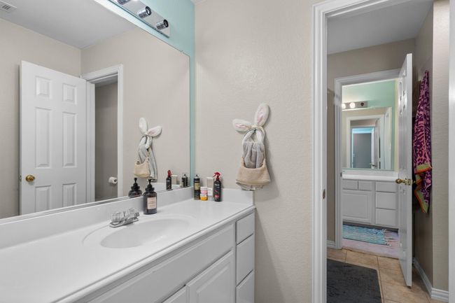 Bathroom featuring vanity and tile patterned flooring | Image 32