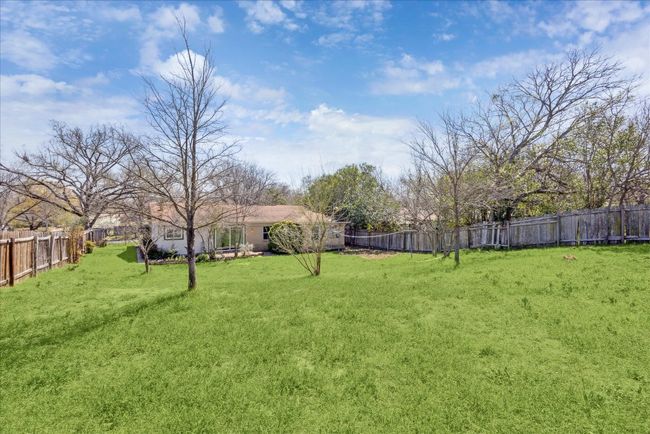 View of yard featuring a fenced backyard | Image 26