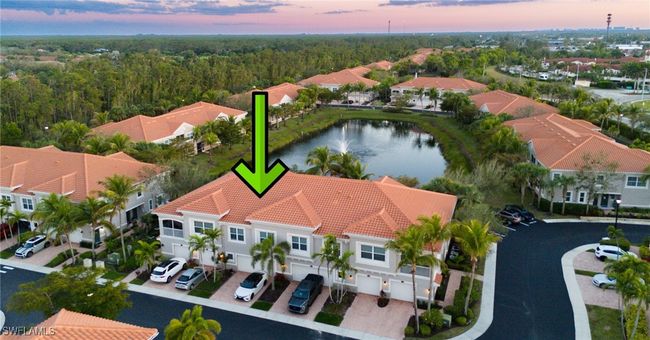 Birds eye view of property with a residential view, a water view, and a view of trees | Image 29