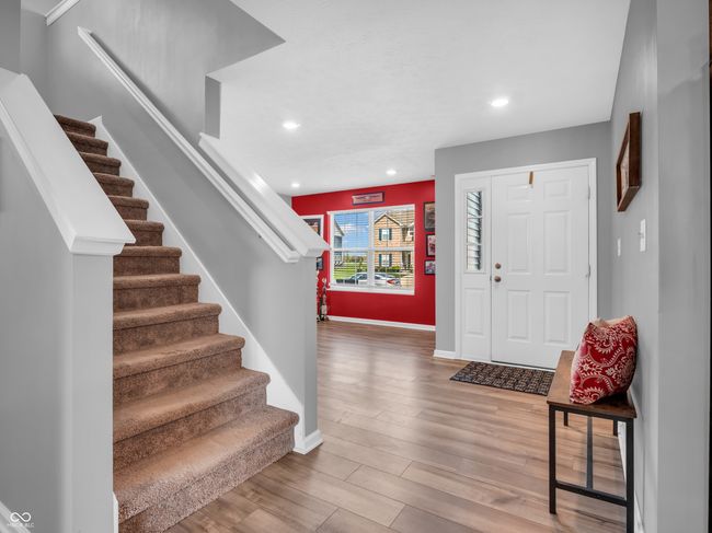 foyer with recessed lighting, stairway, wood finished floors, and baseboards | Image 4