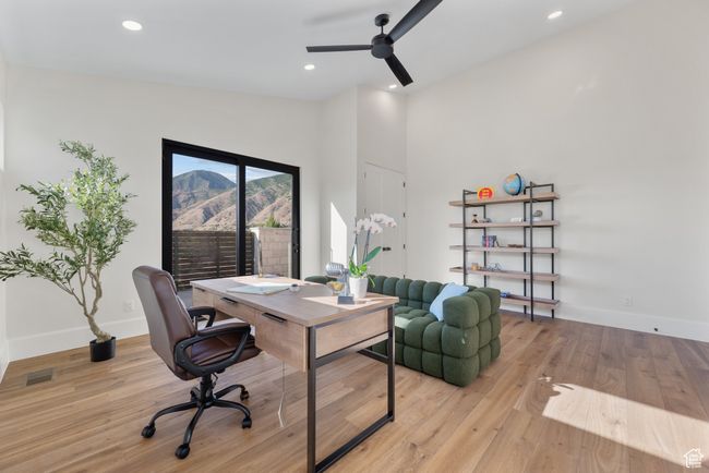 Office area with a ceiling fan, light wood finished floors, and recessed lighting. this is also listed as the 2nd bdm on main floor | Image 49