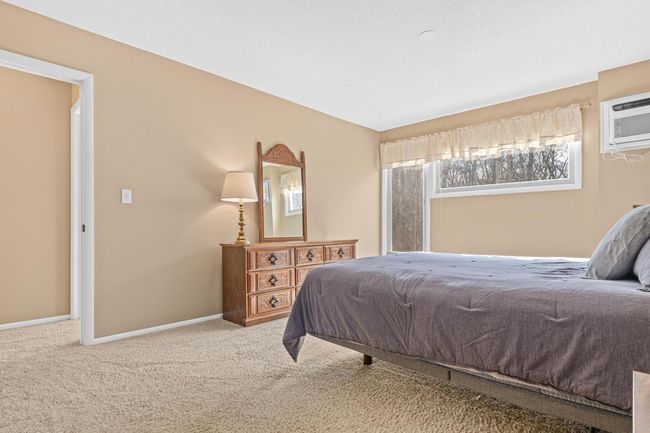 View from entry of Walk-Thru Closet towards Bedroom | Image 12