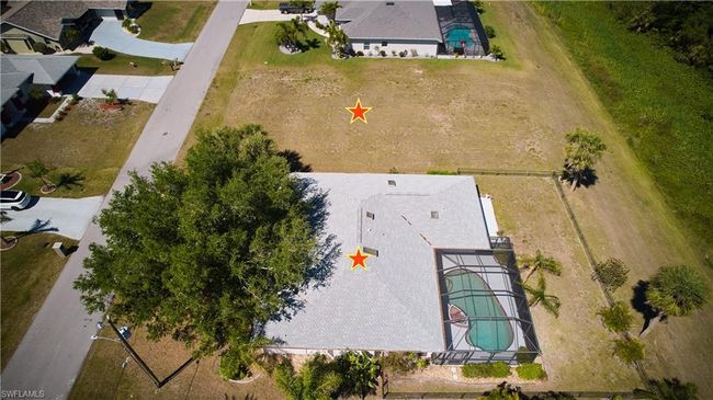 The vacant lot next to this home is available as well (1390 Navigator). | Image 21