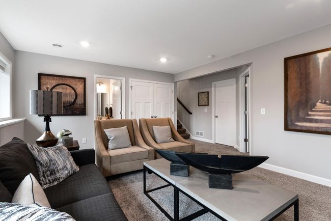(Photo of decorated model, actual home's finishes will vary) A perfect spot for homework or arts and crafts! | Image 19