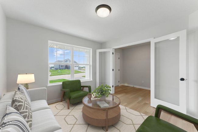 Flex room on the main floor features glass French doors! | Image 5