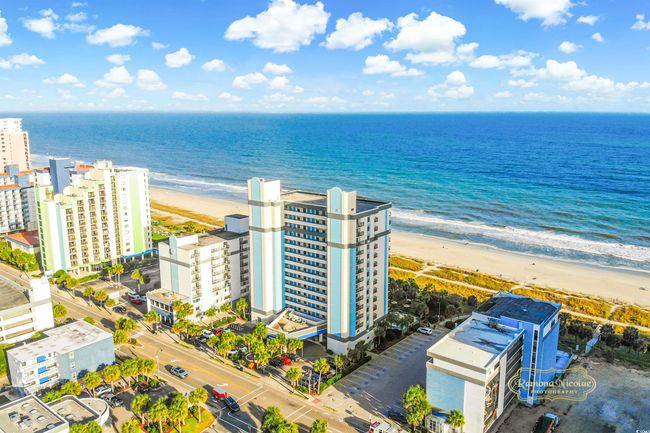 Birds eye view of property featuring a view of the beach and a water view | Image 26
