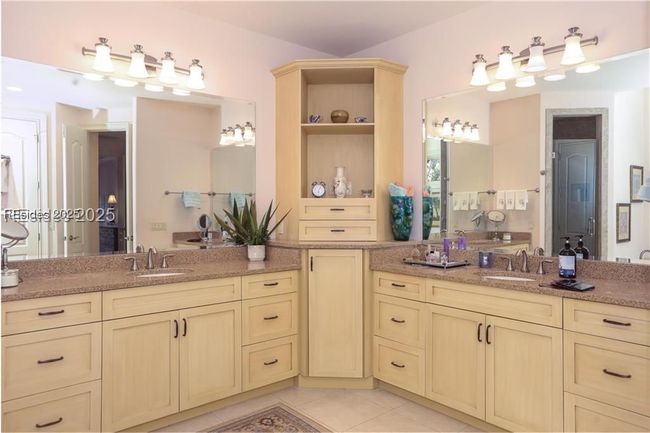 Tons of storage in the Primary bathroom as well as a linen closet. | Image 36