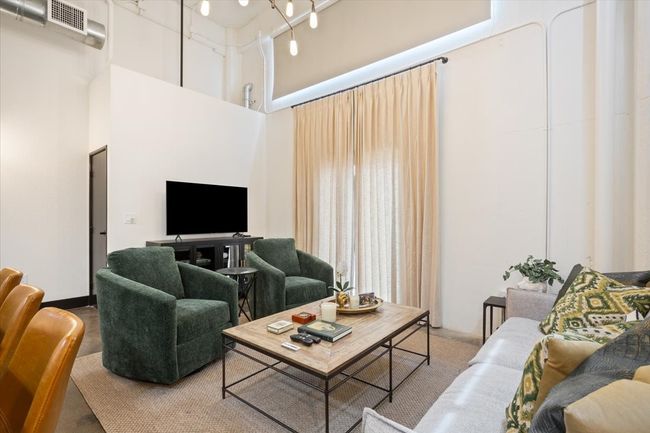 Living room with a high ceiling | Image 5