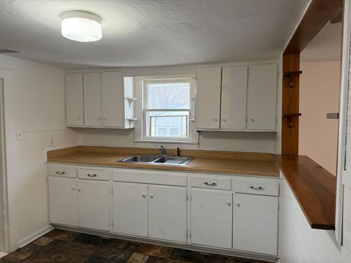 310 S Brady St, Corunna, MI, 48817-1703 | Card Image