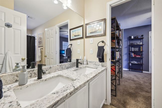 Secondary bathroom with updated dual vanity. | Image 28