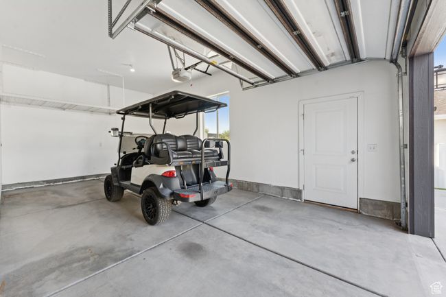 Garage with a garage door opener | Image 40
