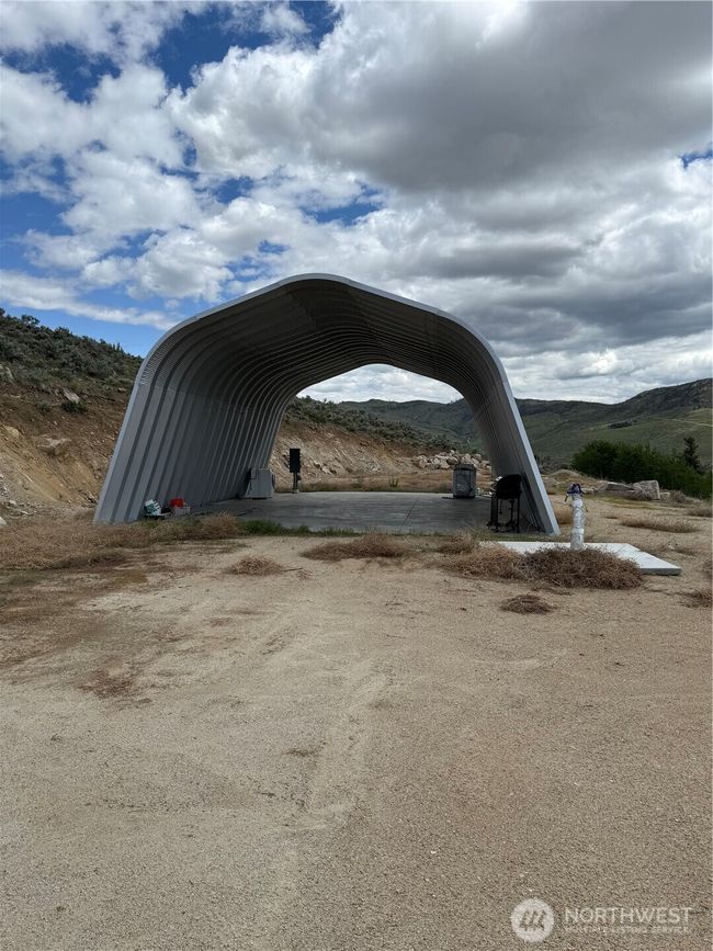 Great shelter on concrete slab with utilities adjacent. | Image 12