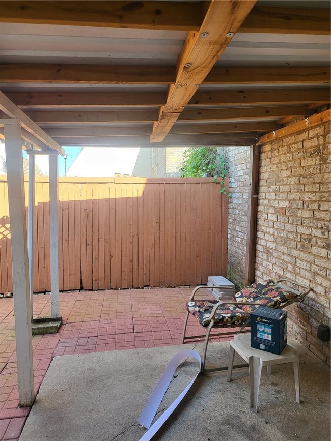 View of patio with fence | Image 4