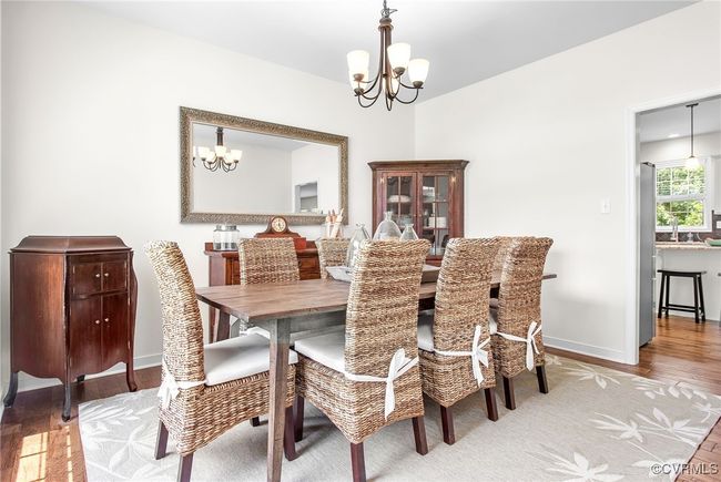 Formal dining room with direct access to the eat-in kitchen | Image 17