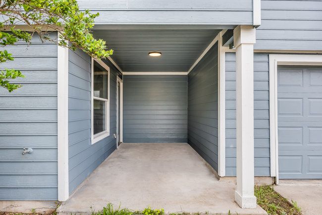 View of patio with a garage | Image 35