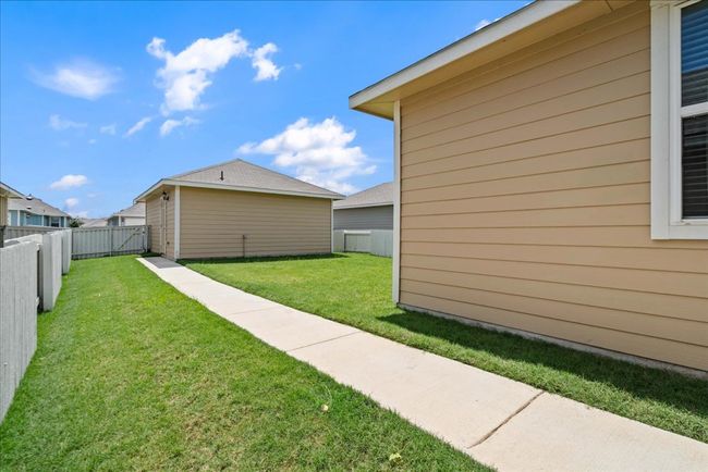View of private, fenced backyard | Image 23